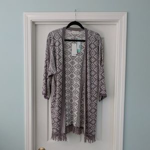 Woman's long mid thigh legth sweater